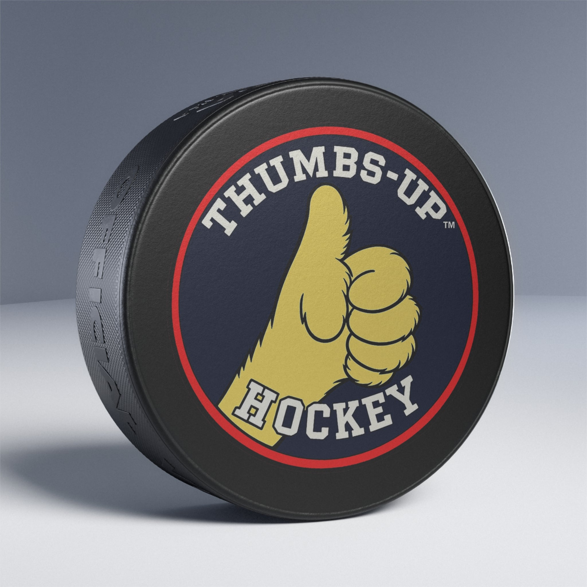 Thumbs-Up Hockey Puck